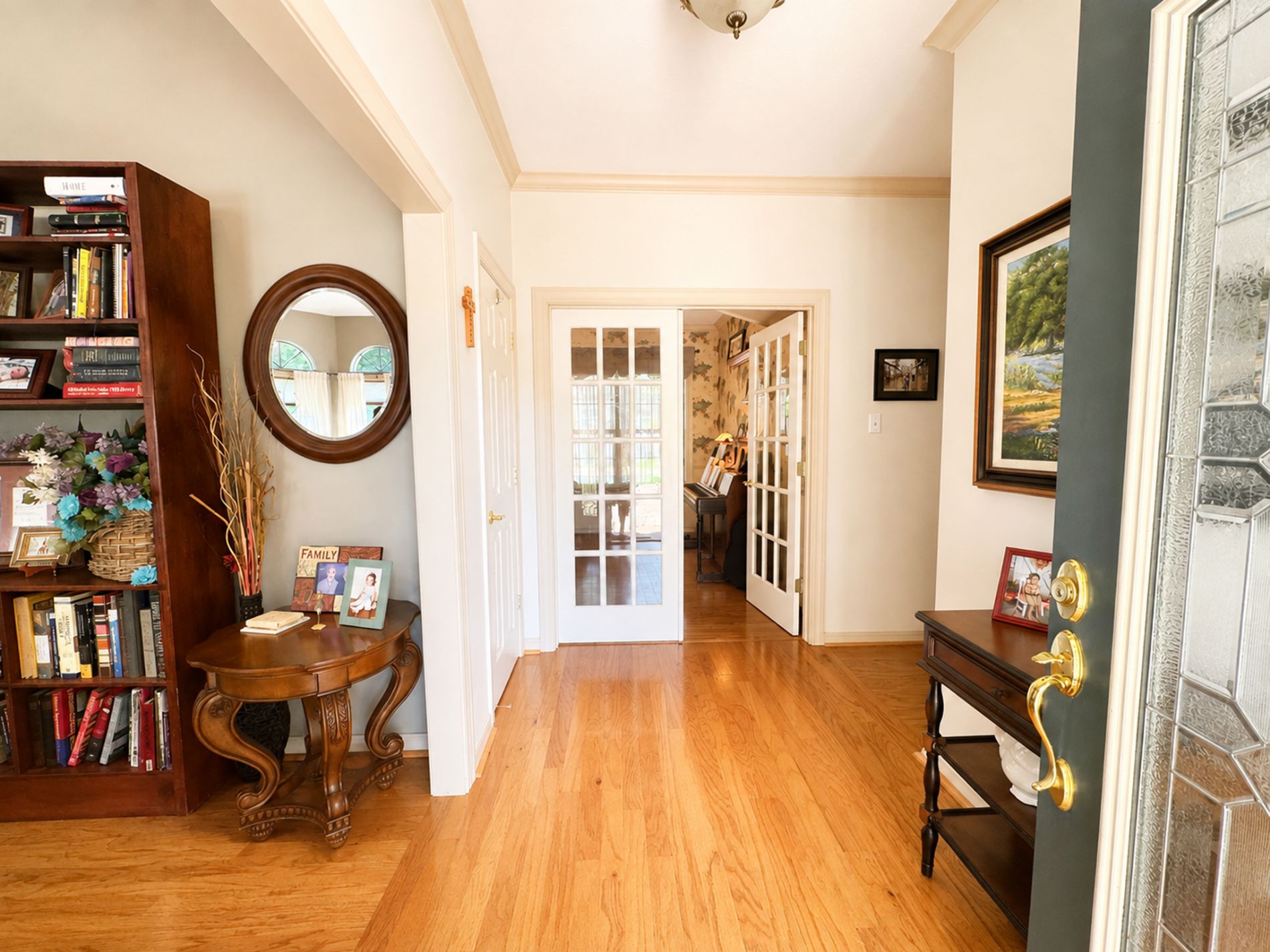 Foyer entrance leading into living room and office. Foyer entrance leading into living room and office.