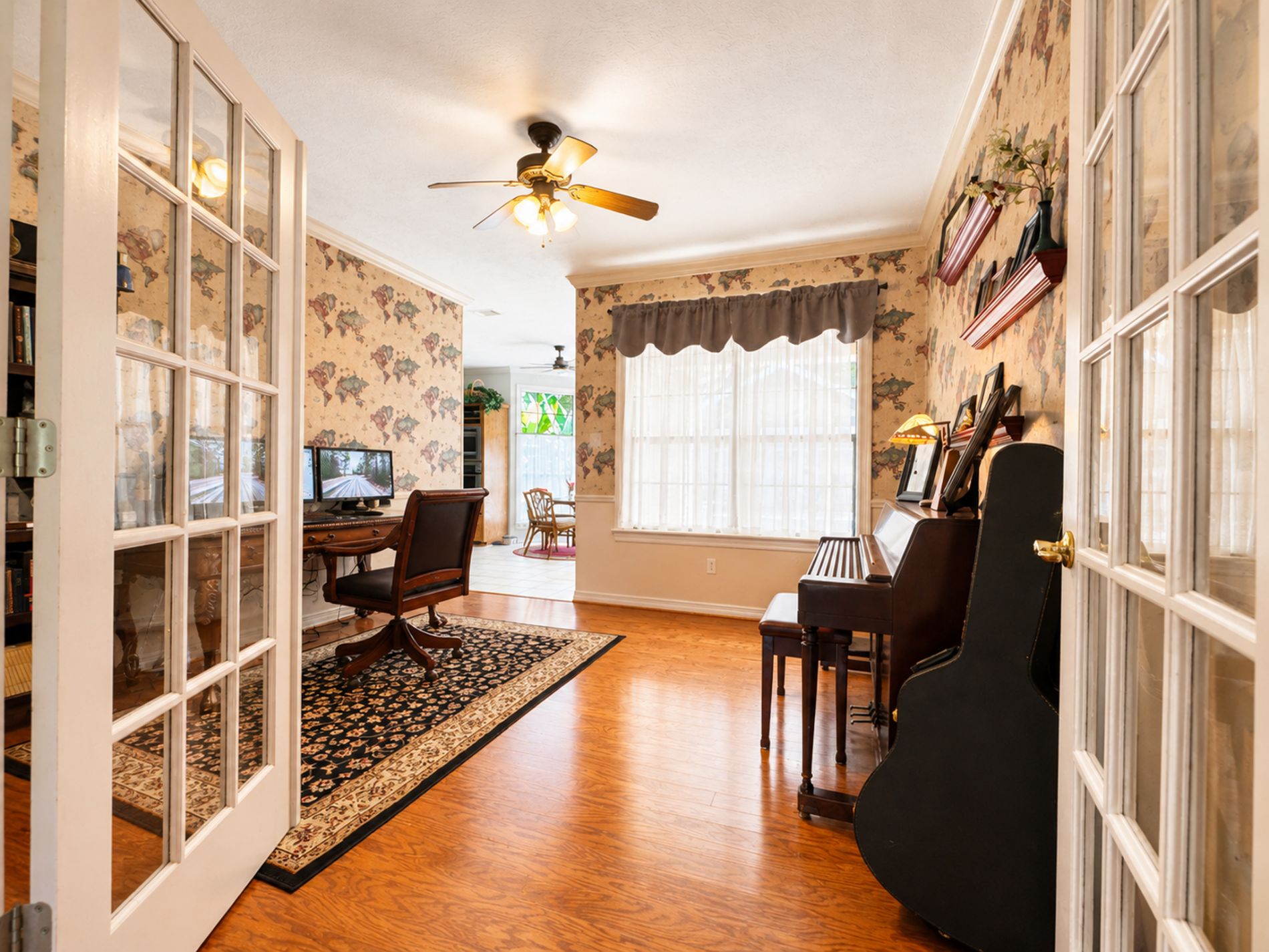 Office, music or bonus room just feet from kitchen and living room. Office, music or bonus room just feet from kitchen and living room.